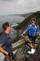 French bicyclists along the coast near Deba, Guipuzcoa, Basque Country, Northern Spain. MR