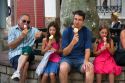Family eating ice cream in the town of Saint-Jean-de-Luz, Pyrenees-Atlantiques, French Basque Country, Southwest France.