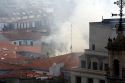 Firefighters on the roof of an apartment on fire in the city of Bilbao, Biscay, northern Spain.