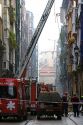 Fire trucks at the scene of an apartment fire in the city of Bilbao, Biscay, northern Spain.