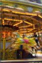 Merry-go-round in motion in the market town of Stratford-upon-Avon, Warwickshire, England.