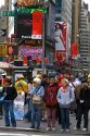Pedestrians in Times Square, Manhattan, New York City, New York, USA.
