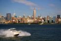 Pleasure boat on the Hudson River and New York City, New York, USA.