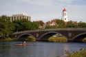 Rowing on the Charles River and Harvard University buildings in Cambridge, Greater Boston, Massachusetts, USA.