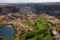 Blue Lakes Country Club golf course and the Perrine Bridge in the Snake River Canyon at Twin Falls, Idaho, USA.
