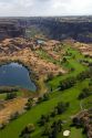 Blue Lakes Country Club golf course and the Perrine Bridge in the Snake River Canyon at Twin Falls, Idaho, USA.