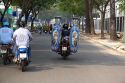 Motorbike hauling large decorative urns in Ho Chi Minh City, Vietnam.