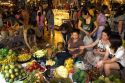 Vendors selling produce in the Ben Thanh Market located in Ho Chi Minh City, Vietnam.