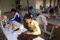 Disadvantaged Vietnamese youth learn to use a sewing machine at a vocational school named Kids First Vietnam in Dong Ha, Vietnam.