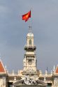 Flag of Vietnam atop the Ho Chi Minh City Hall in Vietnam.