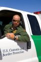 United States Border Patrol agent at the U.S./Mexico border along the All American Canal near Calexico, California