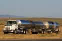 Double tank truck traveling on Interstate 84 near Boise, Idaho, USA.