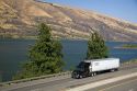 Truck transporting freight through the Columbia River Gorge near Hood River, Oregon, USA.