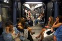 Passengers ride on the Paris Metro in Paris, France.