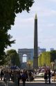 The Obelisk of Luxor located in the Place de la Concorde and the Arch de Triomphe at the west end of the Avenue des Champs-Elysees in Paris, France.
