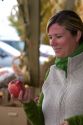 Woman shopping for apples at a farmers market in Fruitland, Idaho. MR