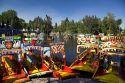 Colorful trajineras travel on the Xochimilco canals within Mexico City, Mexico.