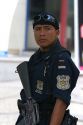 Mexican police officer with gun in Acapulco, Guerrero, Mexico.