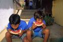 Chilean boys eat watermelon in Santiago, Chile.