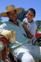 Chilean farmer and son in the Central Valley of Chile.