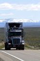 Transport truck traveling on Highway 95 near Jordan Valley, Oregon, USA.