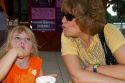 Grandmother with her 3 year old grand daughter eating ice cream in Brandon, Florida, USA. MR