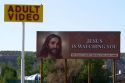 Adult Video and religious signage in Farmington, New Mexico, USA.