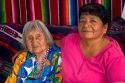 Native Pueblo elderly woman and daughter in San Felipe Pueblo, New Mexico, USA.