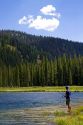 Fishing Bull Trout Lake located in the Boise National Forest near Lowman, Idaho, USA.