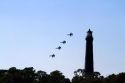 The Blue Angels F/A-18 Hornets fly in formation above Pensacola, Florida, USA.