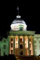 The Alabama State Capitol Building at night located on Goat Hill in Montgomery, Alabama, USA.