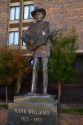 Life-size bronze statue of Hank Williams stands in downtown Montgomery, Alabama, USA.