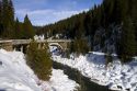 The Rainbow Bridge spanning the North Fork of the Payette River during winter, Valley County, Idaho, USA.