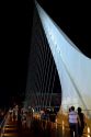 The Puente de la Mujer footbridge at night in the Puerto Madero district of Buenos Aires, Argentina.