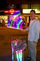 Street vendor selling glow sticks and toys at Necochea, Argentina.