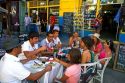 People dine at an outdoor cafe in the La Boca barrio of Buenos Aires, Argentina.