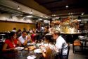 People dine at a restaurant in the Miraflores district of Lima, Peru.