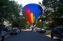 Hot air balloon landing in a residential area of Boise, Idaho, USA.
