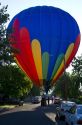 Hot air balloon landing in a residential area of Boise, Idaho, USA.