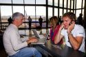 People use wi-fi internet at the Phoenix Sky Harbor International Airport located in the city of Phoenix, Arizona, USA.