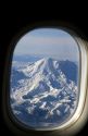 View of Mount Rainier taken from an airplane window.