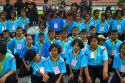 Thai school students wearing uniforms visit The Grand Palace in Bangkok, Thailand.