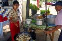 Street food vendor selling eggrolls in (Rangoon) Yangon, (Burma) Myanmar.