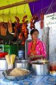 Street food vendor selling various meats in (Rangoon) Yangon, (Burma) Myanmar.