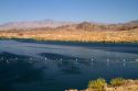 The Colorado River at Parker Dam creates Lake Havasu reservoir in La Paz County, Arizona and San Bernardino County, California, USA.