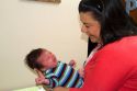 Hispanic mother holding her infant son in Boise, Idaho, USA. MR
