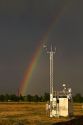Rainbow over Ada County, Idaho, USA with remote weather monitoring station.