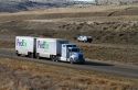 Semi truck hauling a double trailer on Interstate 84 near Boise, Idaho, USA.