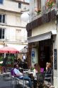 People sit at an outdoor cafe at Angouleme in southwestern France.