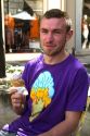 French man eating an ice cream cone wearing a matching t-shirt at Angouleme in southwestern France.